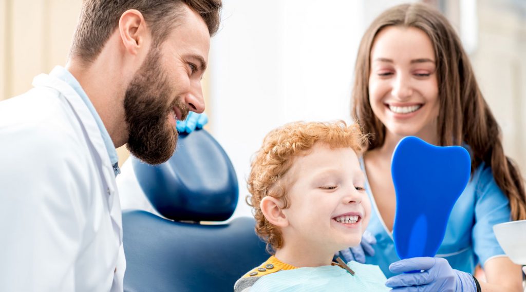 Pediatric Dentistry (Doctor, Assistant, and Child)